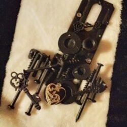 Altered art/Mixed media... hanging decor..