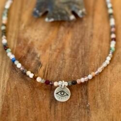 crystal/gemstone faceted necklace with evil eye charm