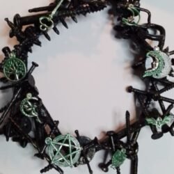 Altered art, hardware wreath..iridescent blues and greens...