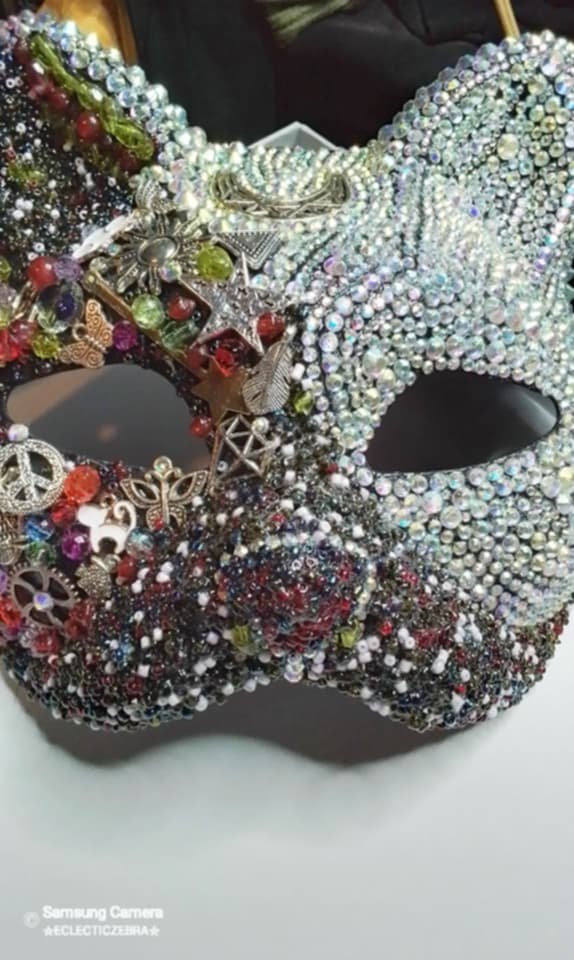 Altered art cat mask decor..